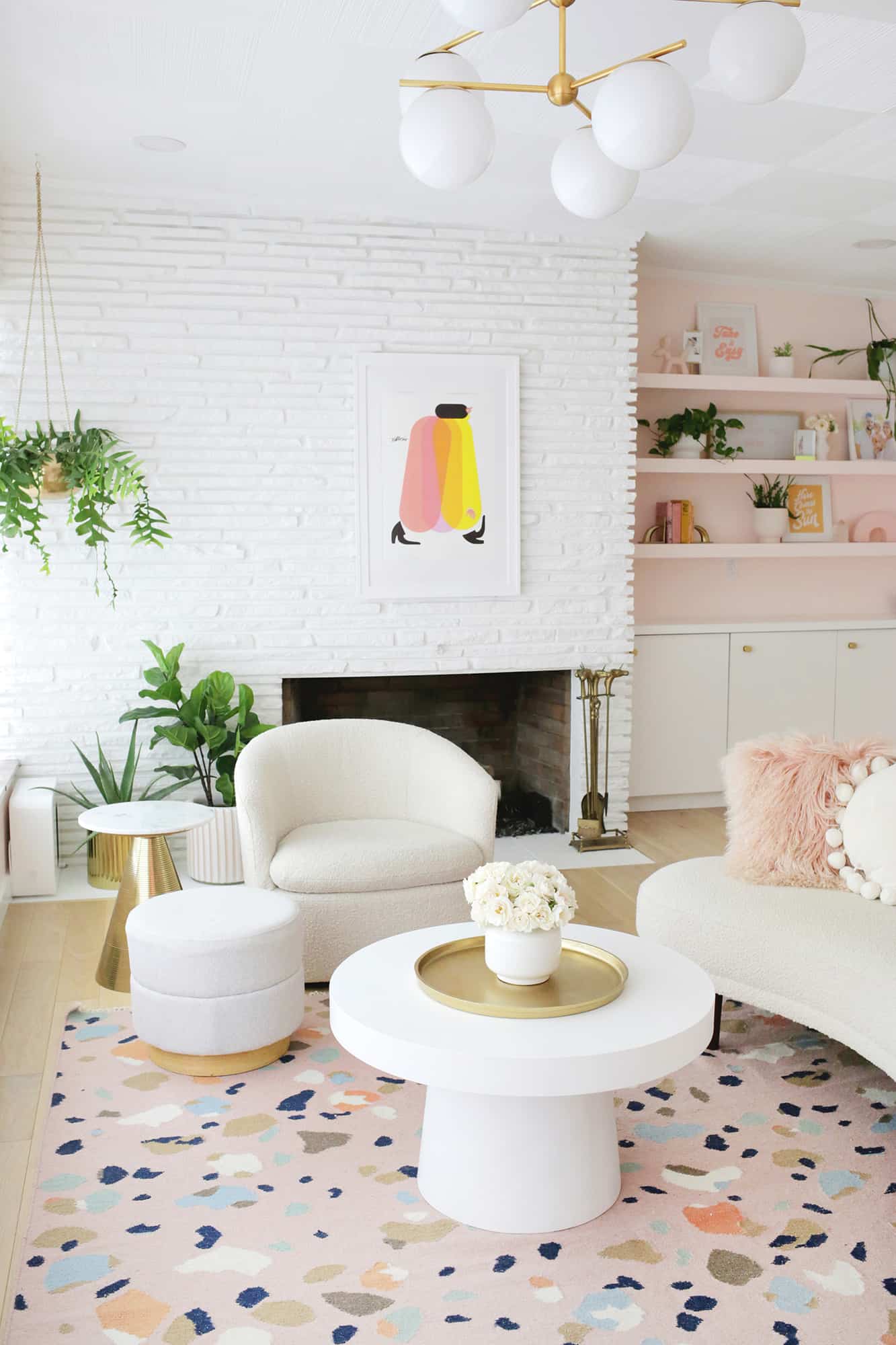 view of fireplace with chair in front of it