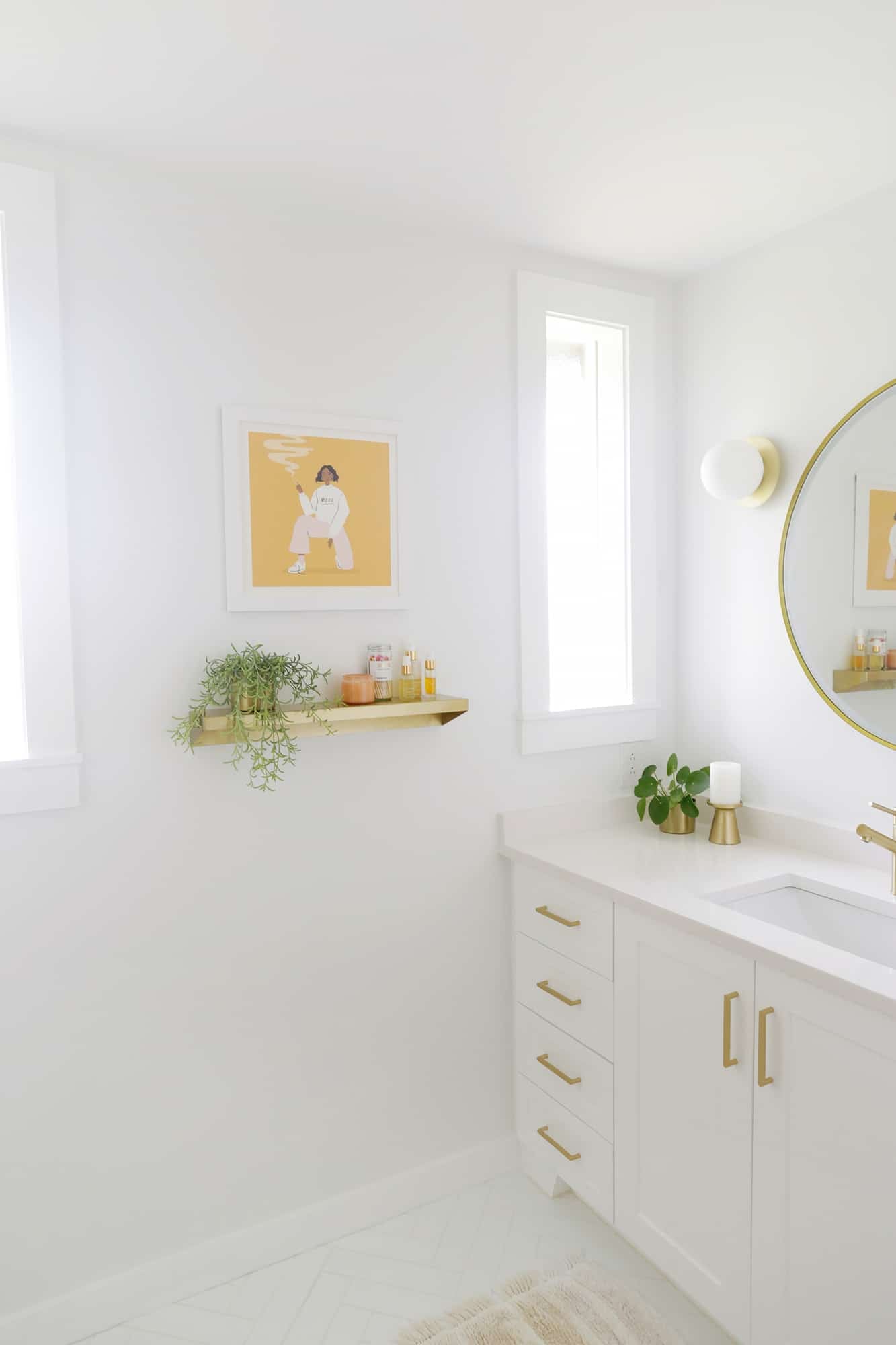 gold shelf with print above it